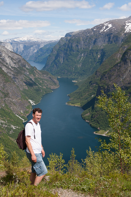 Man with on the background the Naeroyfjord in Norway